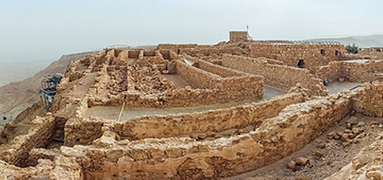 Rocks in the desert and the fortress of Masada